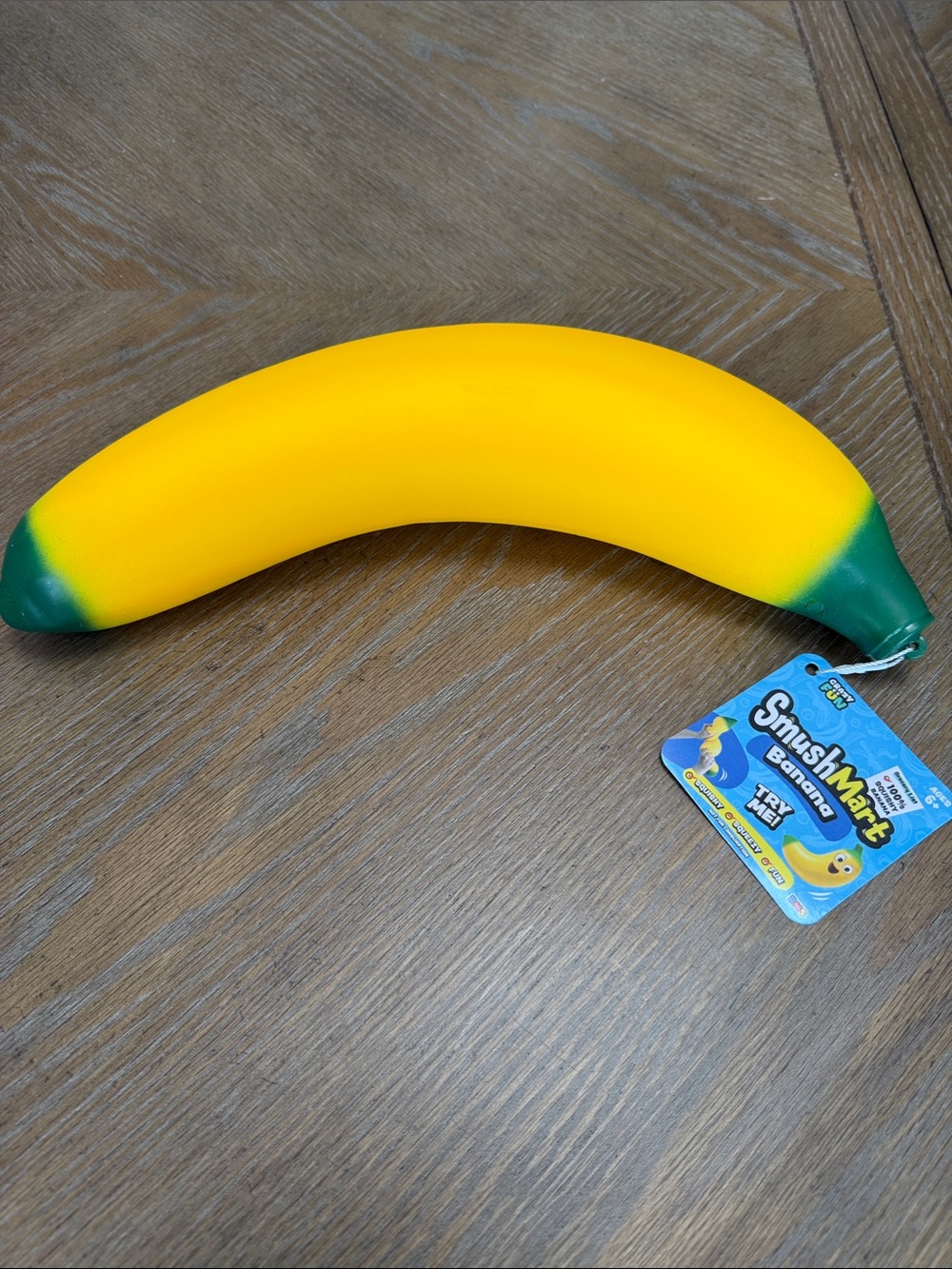 SmushMart Banana Squishy Toy - Bright Yellow with Green Tips